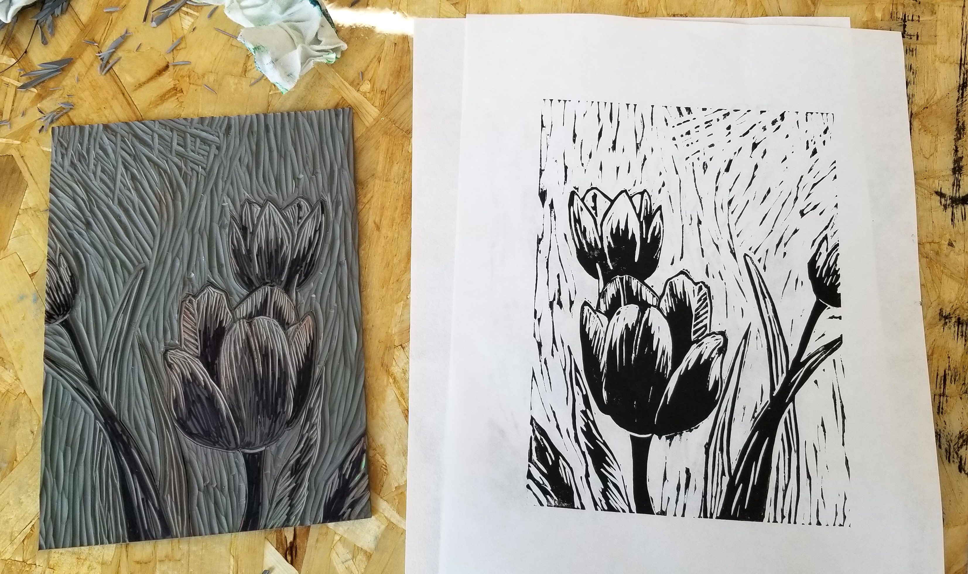 black-and-white relief print featuring tulips - shows inked block and resulting print