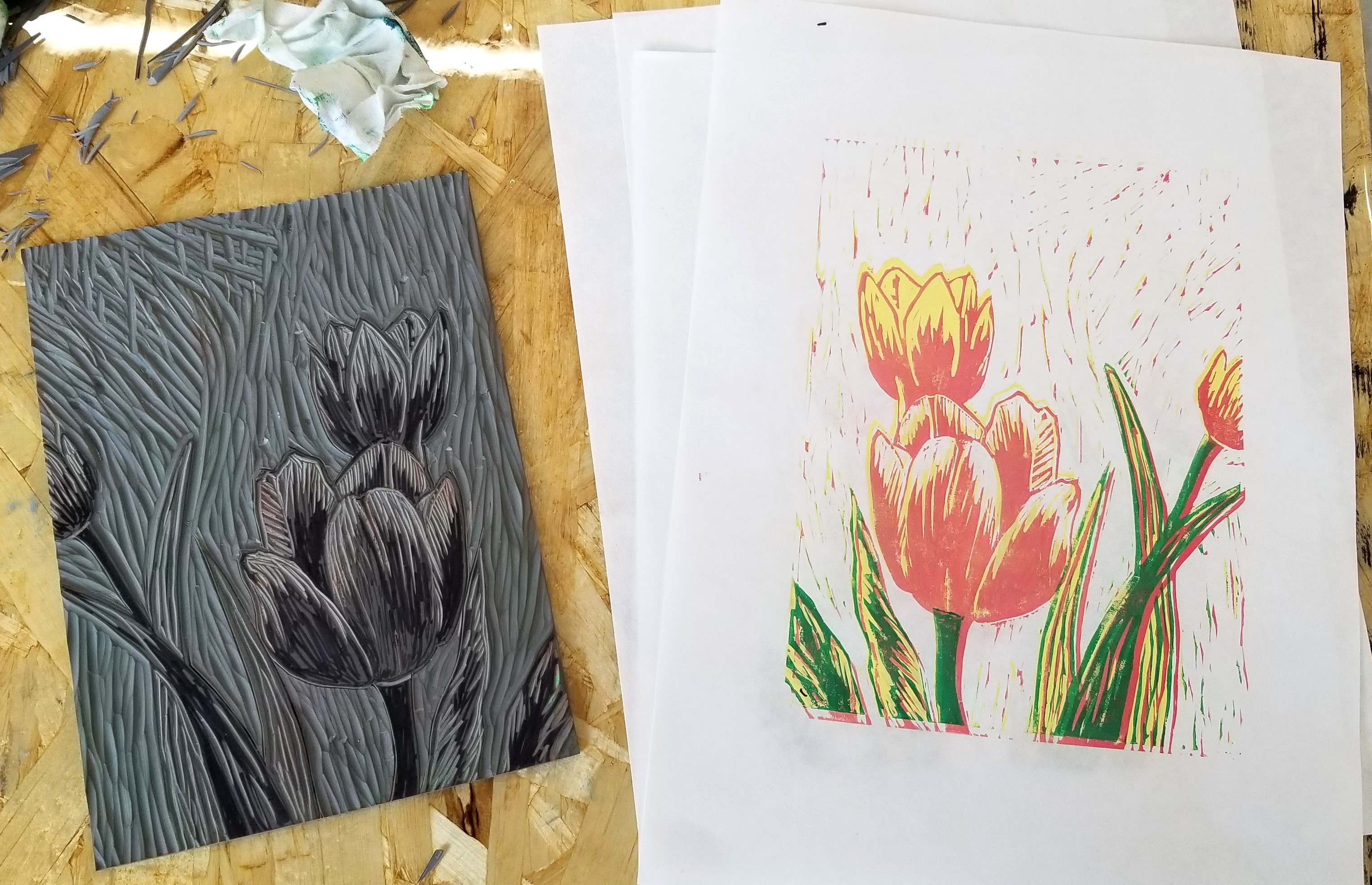3-color reduction relief print featuring tulips - shows inked block and resulting print